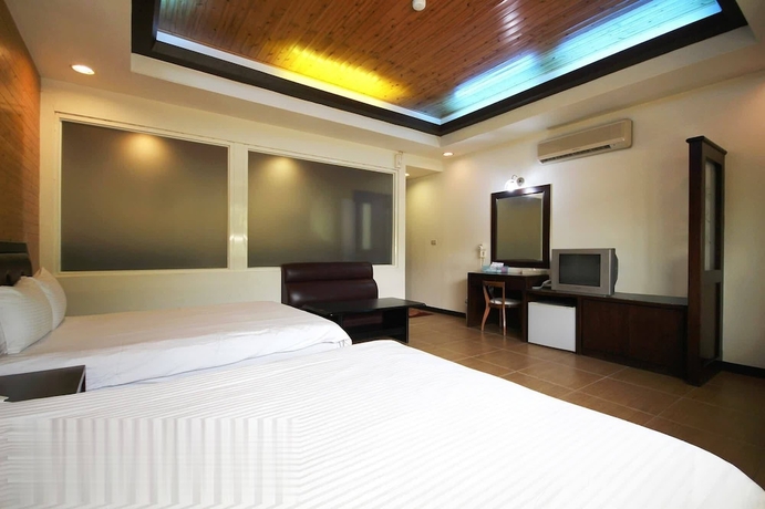 Imagen de la habitación del Hotel Mei Zhi Lin Holiday Homestay. Foto 11