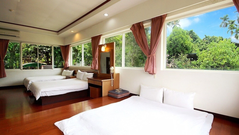 Imagen de la habitación del Hotel Mei Zhi Lin Holiday Homestay. Foto 12