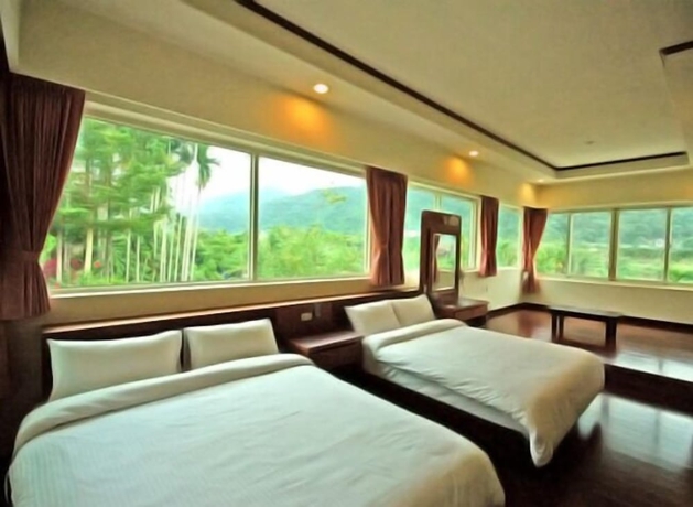Imagen de la habitación del Hotel Mei Zhi Lin Holiday Homestay. Foto 13