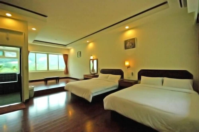 Imagen de la habitación del Hotel Mei Zhi Lin Holiday Homestay. Foto 14