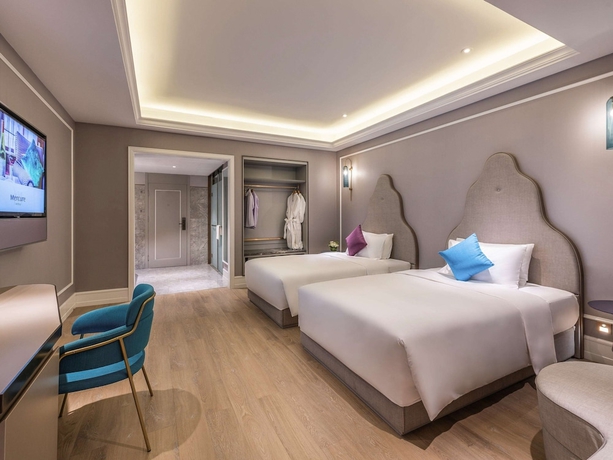 Imagen de la habitación del Hotel Meichen International Hotel. Foto 3