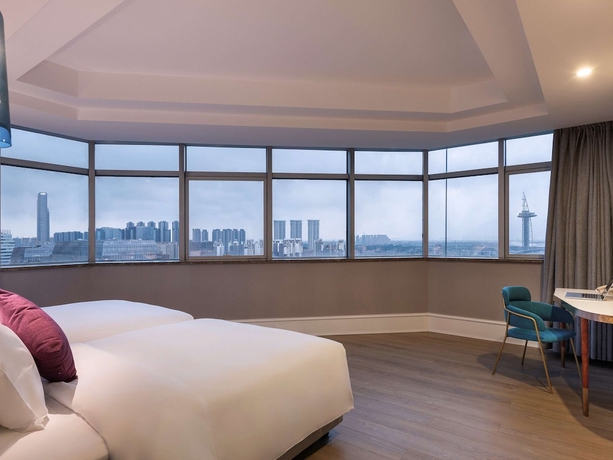 Imagen de la habitación del Hotel Meichen International Hotel. Foto 4