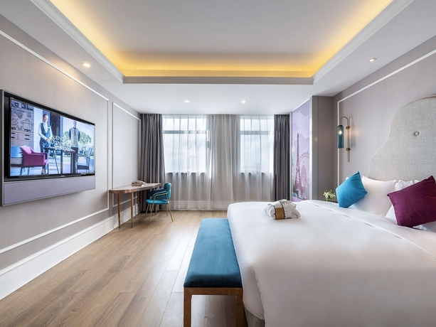 Imagen de la habitación del Hotel Meichen International Hotel. Foto 15