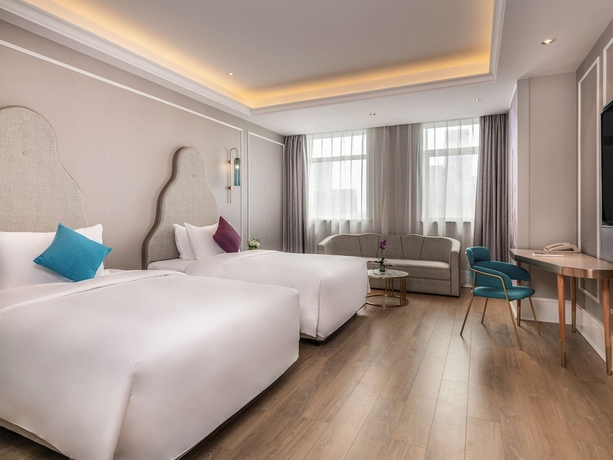 Imagen de la habitación del Hotel Meichen International Hotel. Foto 16
