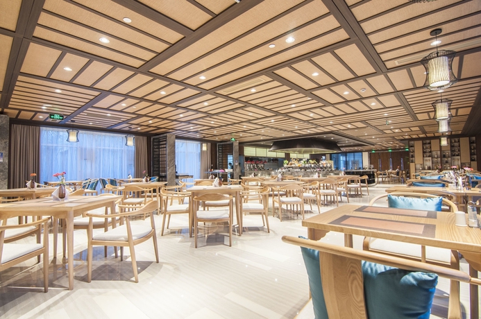 Imagen del bar/restaurante del Hotel Meicheng Swan Lake Resort Hot Spring. Foto 7