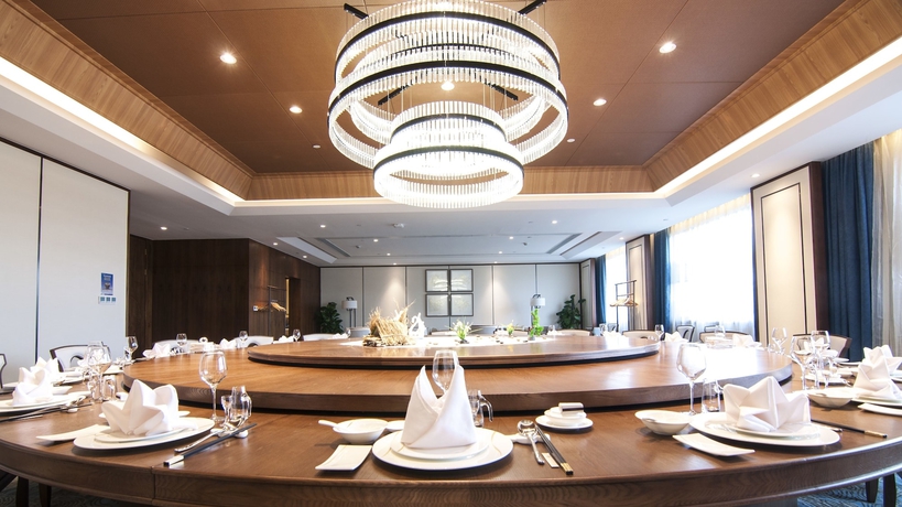 Imagen del bar/restaurante del Hotel Meicheng Swan Lake Resort Hot Spring. Foto 8