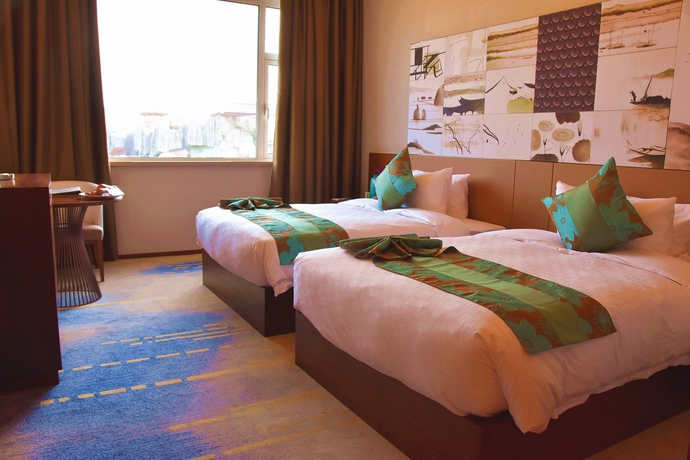 Imagen de la habitación del Hotel Meicheng Swan Lake Resort Hot Spring. Foto 9