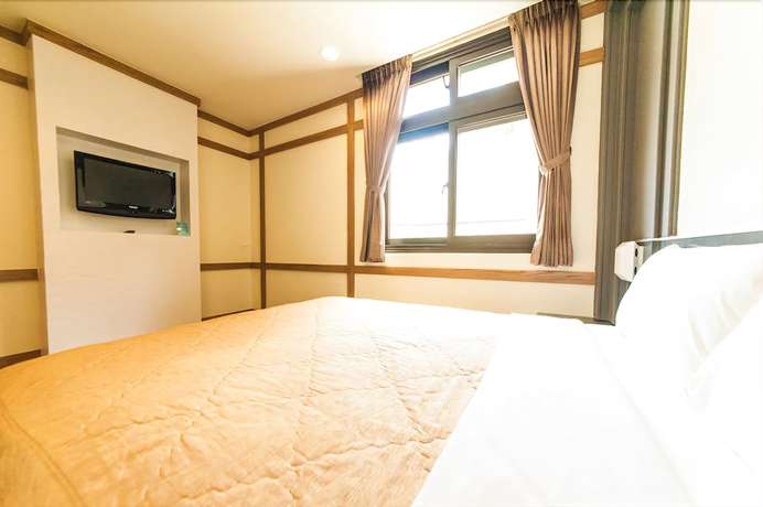 Imagen de la habitación del Hotel Meifon. Foto 2