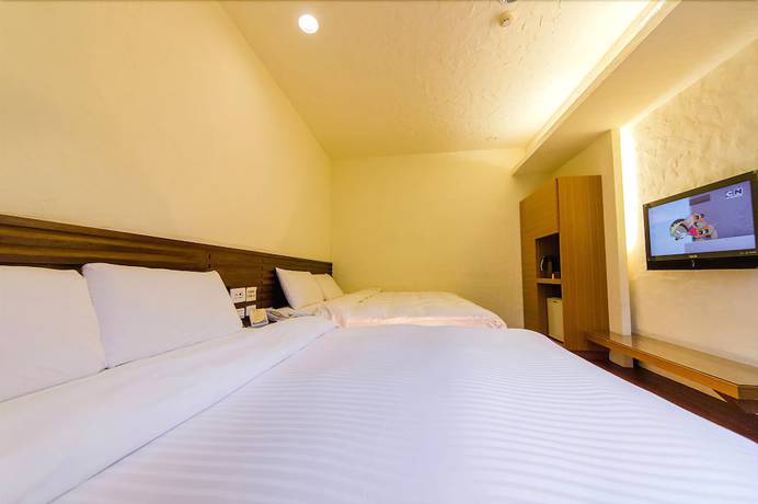 Imagen de la habitación del Hotel Meifon. Foto 11