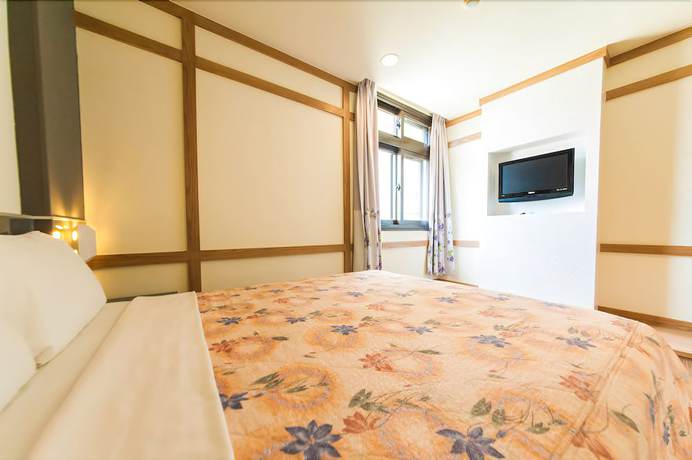 Imagen de la habitación del Hotel Meifon. Foto 12