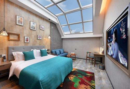 Imagen de la habitación del Hotel Meihao Horses Huaqing Palace. Foto 14