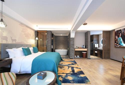 Imagen de la habitación del Hotel Meihao Horses Huaqing Palace. Foto 17