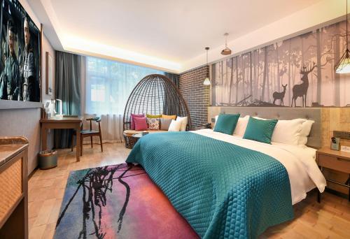 Imagen de la habitación del Hotel Meihao Horses Huaqing Palace. Foto 18