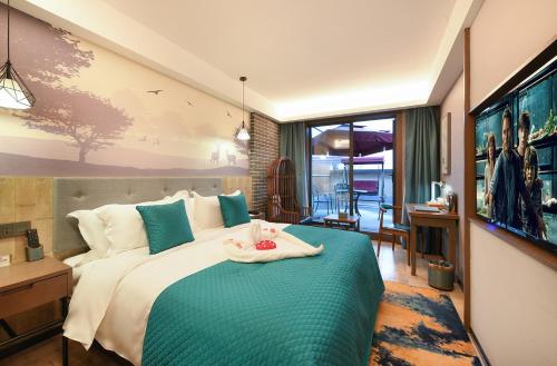 Imagen de la habitación del Hotel Meihao Horses Huaqing Palace. Foto 19