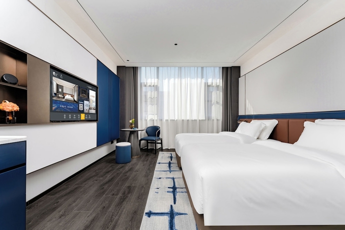 Imagen de la habitación del Hotel Meihao Luoyang Yingtianmen Railway Stn. Foto 6