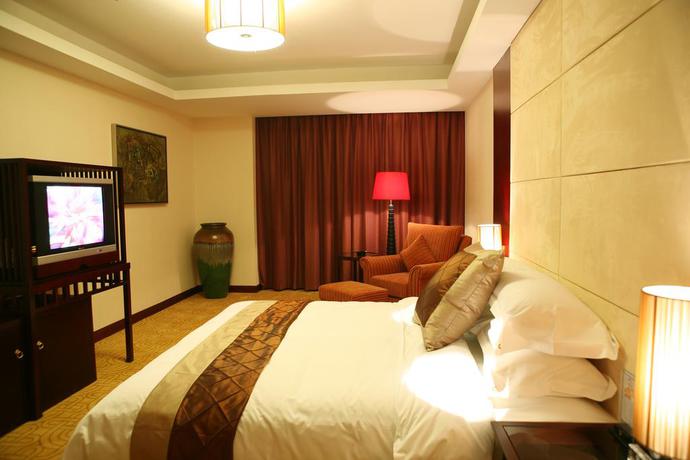 Imagen de la habitación del Hotel Meihua Goldentang International. Foto 3