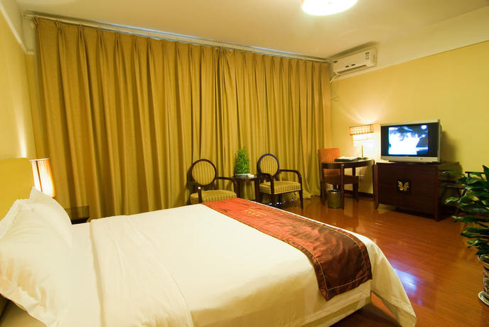 Imagen de la habitación del Hotel Meihua Goldentang International. Foto 4