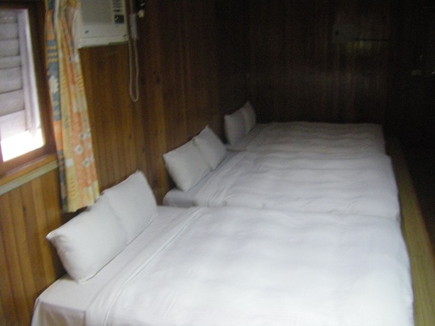 Imagen de la habitación del Hotel Meihua Lake Leisure Farm. Foto 18