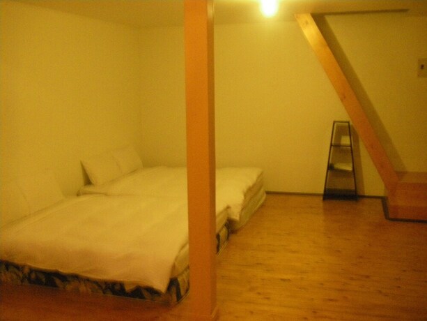 Imagen de la habitación del Hotel Meihua Lake Leisure Farm. Foto 19