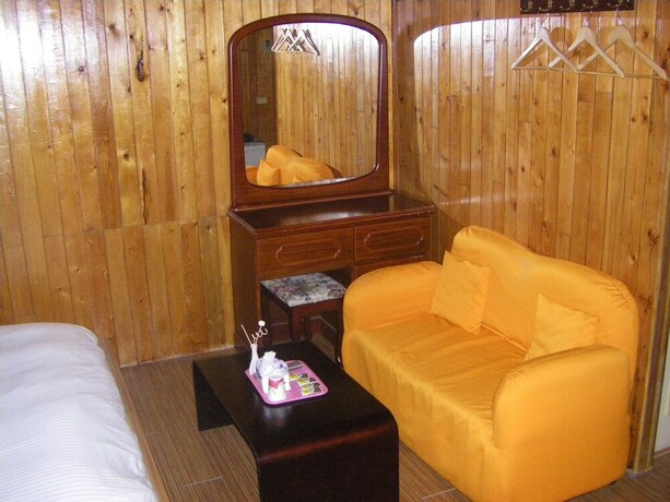 Imagen de la habitación del Hotel Meihua Lake Leisure Farm. Foto 20