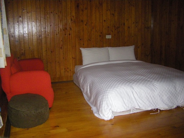 Imagen de la habitación del Hotel Meihua Lake Leisure Farm. Foto 22