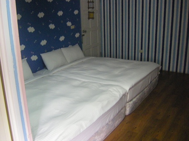 Imagen de la habitación del Hotel Meihua Lake Leisure Farm. Foto 28