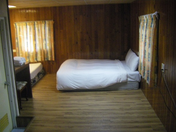 Imagen de la habitación del Hotel Meihua Lake Leisure Farm. Foto 29