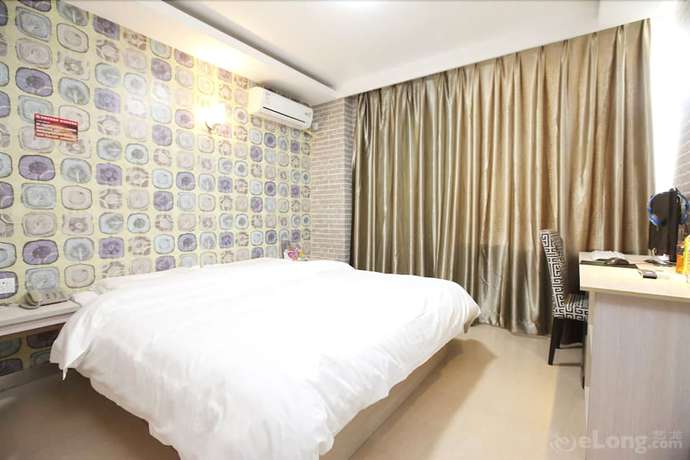 Imagen de la habitación del Hotel Meijia Fashion Hotel. Foto 4