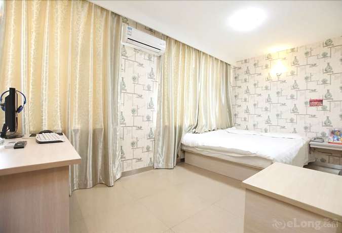 Imagen de la habitación del Hotel Meijia Fashion Hotel. Foto 5