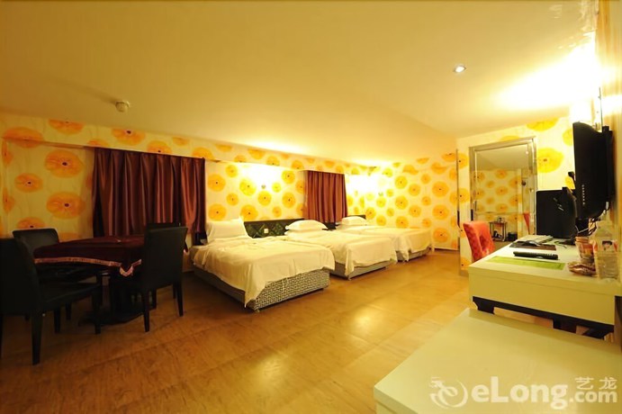 Imagen de la habitación del Hotel Meijia Fashion Hotel. Foto 11