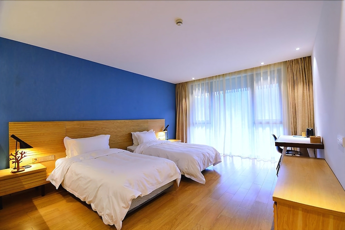 Imagen de la habitación del Hotel Meijie Mountain Hotspring Resort. Foto 2