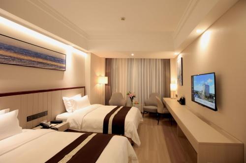 Imagen de la habitación del Hotel Meilun Shanghai Hongqiao Hub. Foto 17