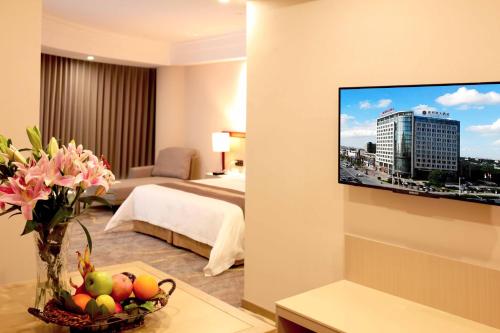 Imagen de la habitación del Hotel Meilun Shanghai Hongqiao Hub. Foto 18