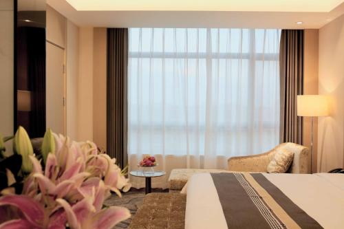 Imagen de la habitación del Hotel Meilun Shanghai Hongqiao Hub. Foto 19