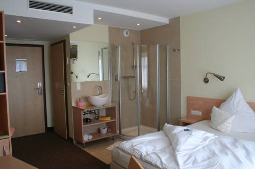 Imagen de la habitación del Hotel Mein Schlosshotel. Foto 8