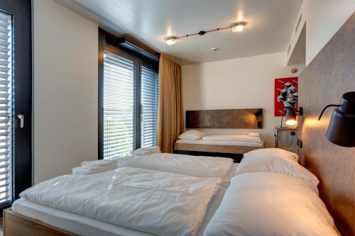 Imagen de la habitación del Hotel Meininger Berlin Tiergarten. Foto 5