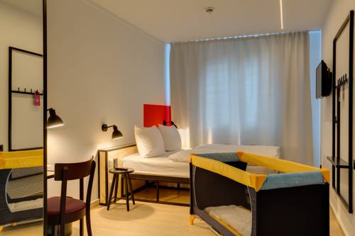 Imagen de la habitación del Hotel Meininger Leipzig Hauptbahnhof. Foto 3