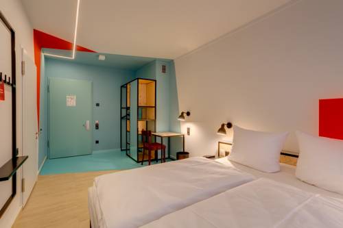 Imagen de la habitación del Hotel Meininger Leipzig Hauptbahnhof. Foto 4