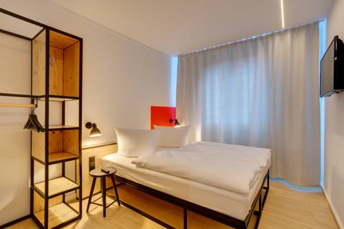 Imagen de la habitación del Hotel Meininger Leipzig Hauptbahnhof. Foto 6