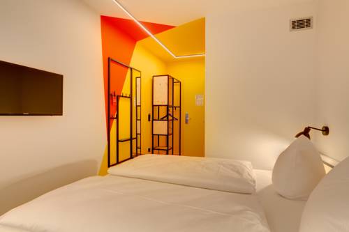 Imagen de la habitación del Hotel Meininger Leipzig Hauptbahnhof. Foto 7