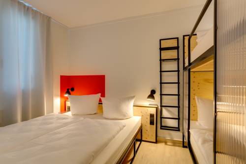 Imagen de la habitación del Hotel Meininger Leipzig Hauptbahnhof. Foto 9