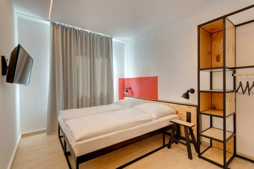 Imagen de la habitación del Hotel Meininger Leipzig Hauptbahnhof. Foto 11