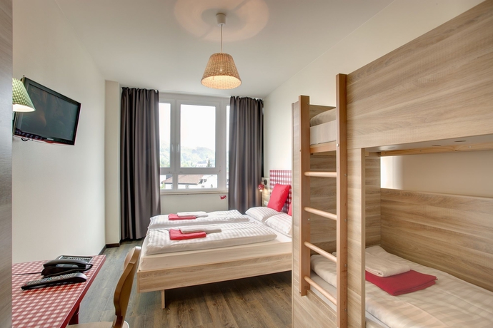 Imagen de la habitación del Hotel Meininger Salzburg City Center. Foto 10