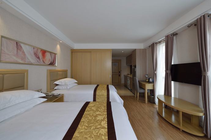 Imagen de la habitación del Hotel Meiqianju Garden. Foto 3