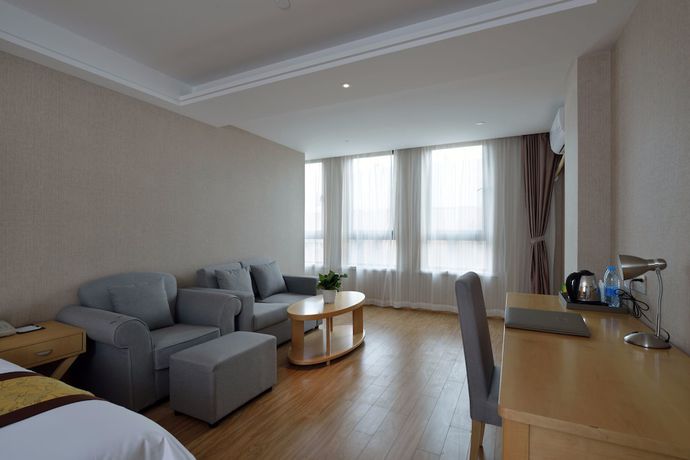 Imagen de la habitación del Hotel Meiqianju Garden. Foto 4