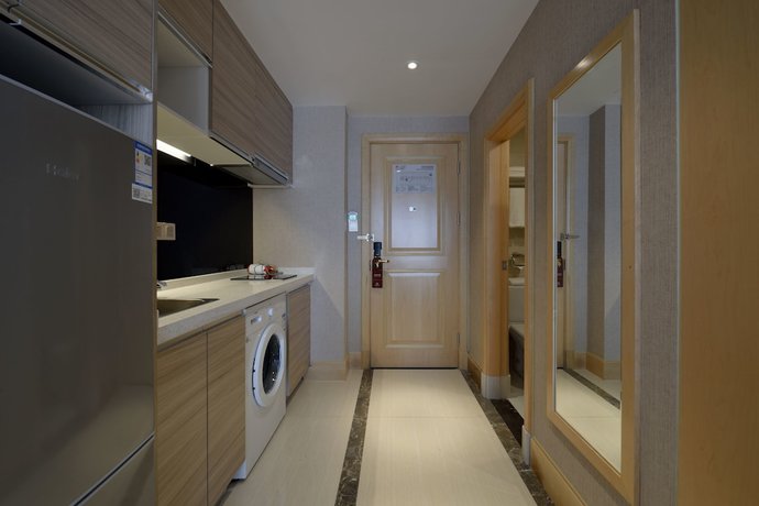 Imagen de la habitación del Hotel Meiqianju Garden. Foto 5