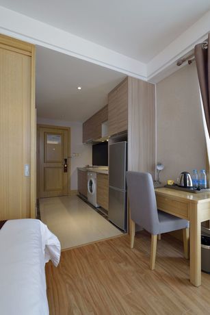 Imagen de la habitación del Hotel Meiqianju Garden. Foto 9