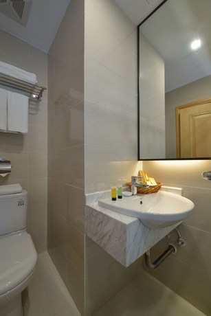Imagen de la habitación del Hotel Meiqianju Garden. Foto 10
