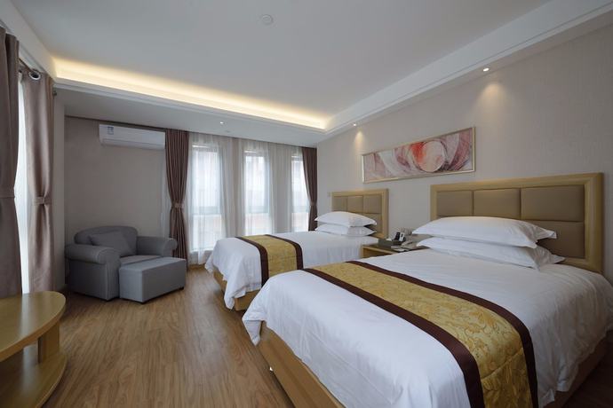Imagen de la habitación del Hotel Meiqianju Garden. Foto 11