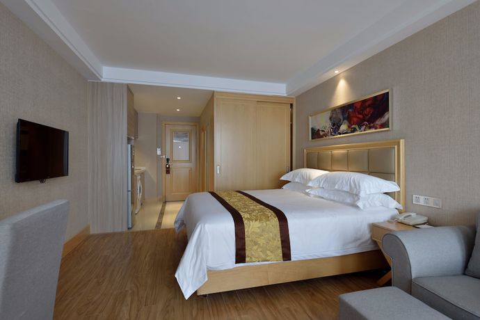 Imagen de la habitación del Hotel Meiqianju Garden. Foto 13